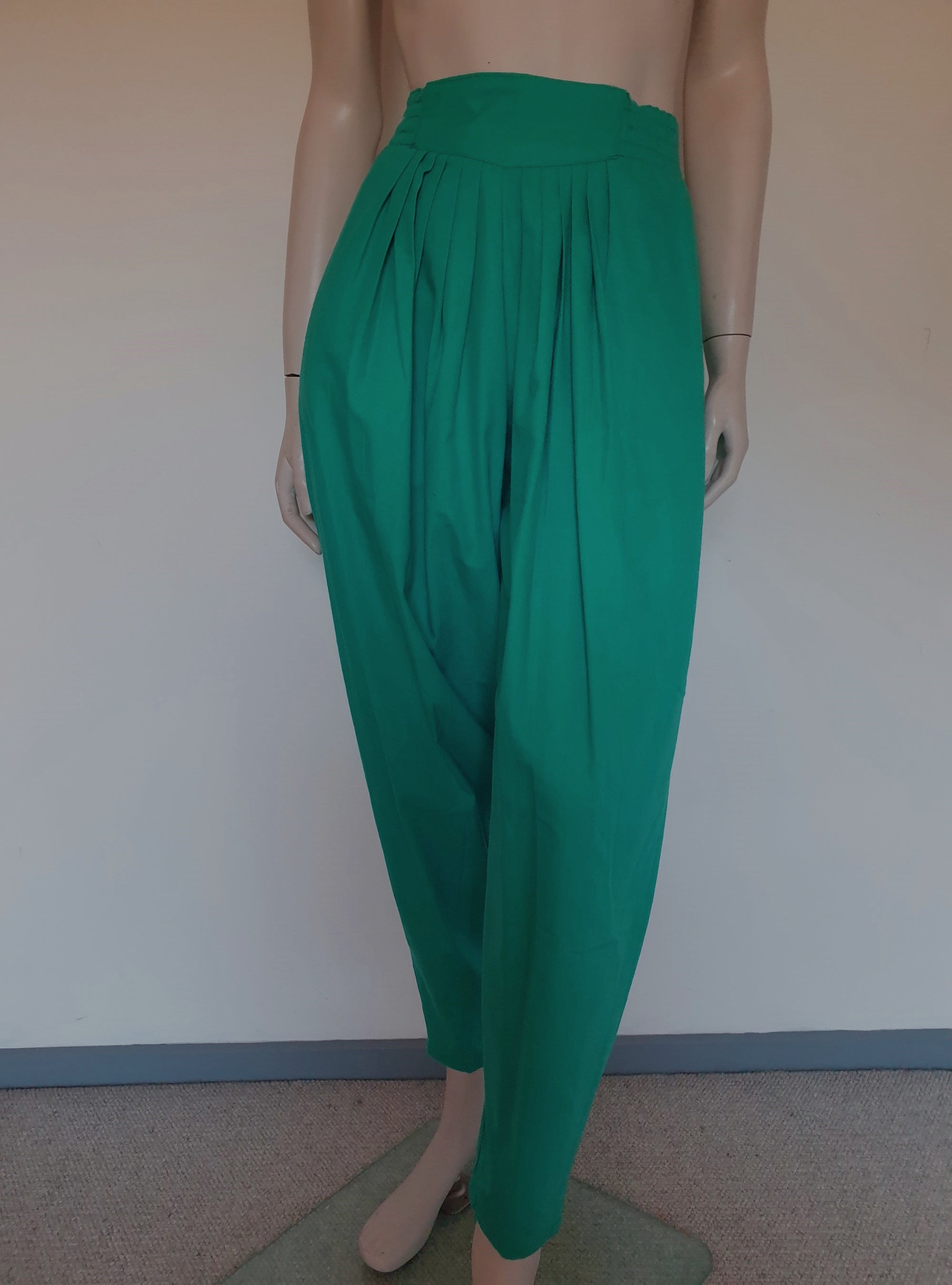vintage 1980s baggy pants with tapered legs in jade green. New old stock.