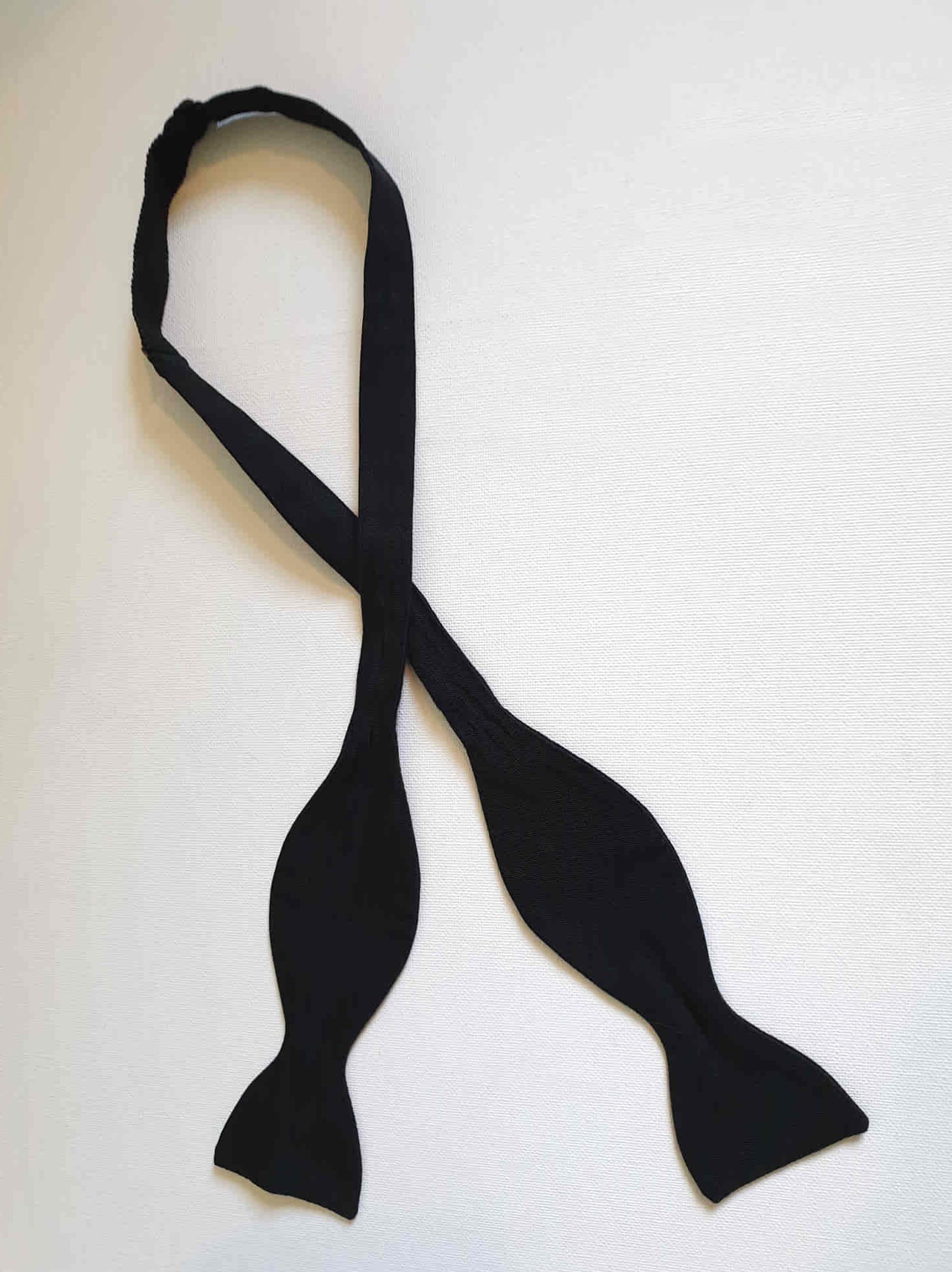 Vintage Black silk faille tie your own bow tie. Adjustable length. No labels.
