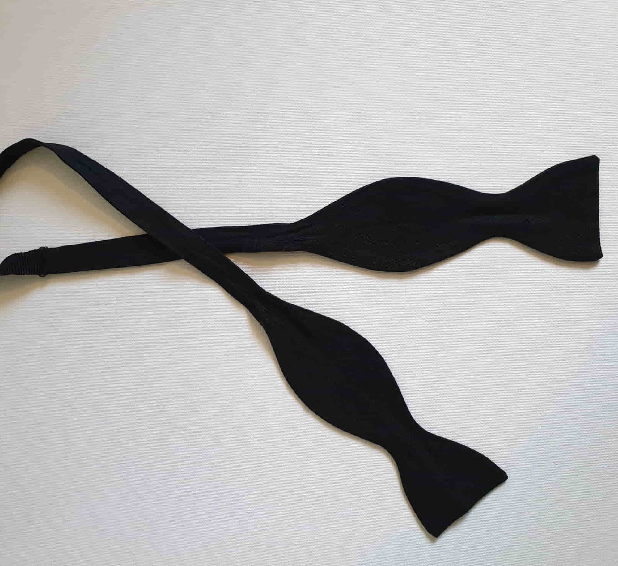 Vintage Black silk faille tie your own bow tie. Adjustable length. No labels.