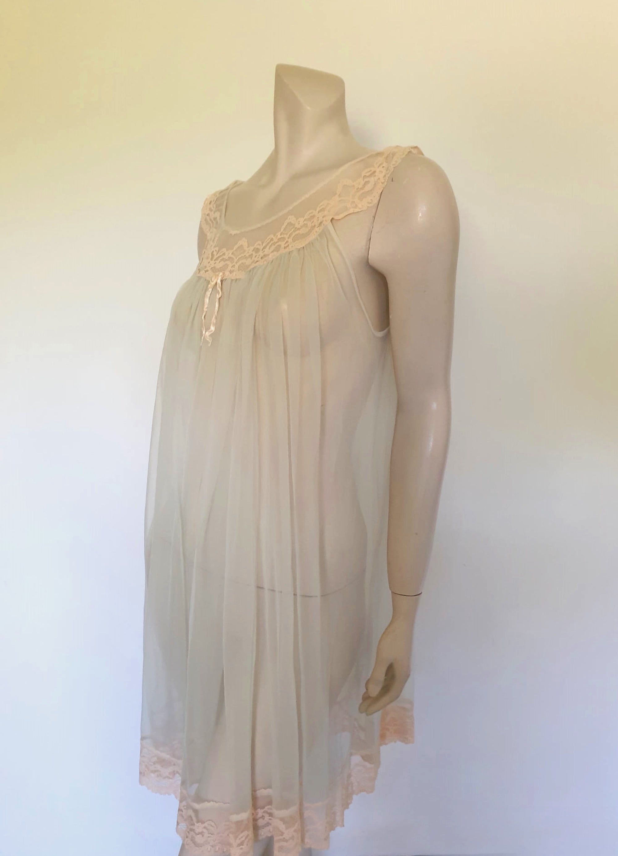 1960s vintage sheer ice blue nightgown with ecru lace