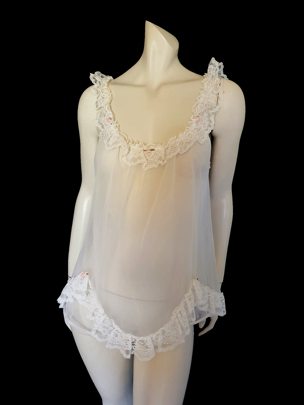 vintage sheer white babydoll nightgown with lace and pink rosettes