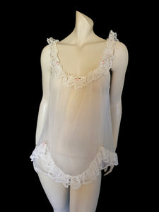 vintage sheer white babydoll nightgown with lace and pink rosettes