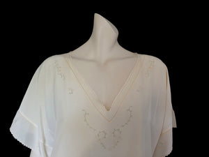 Antique 1920s silky loose-fitting rayon nightgown with hand embroidery medium to large