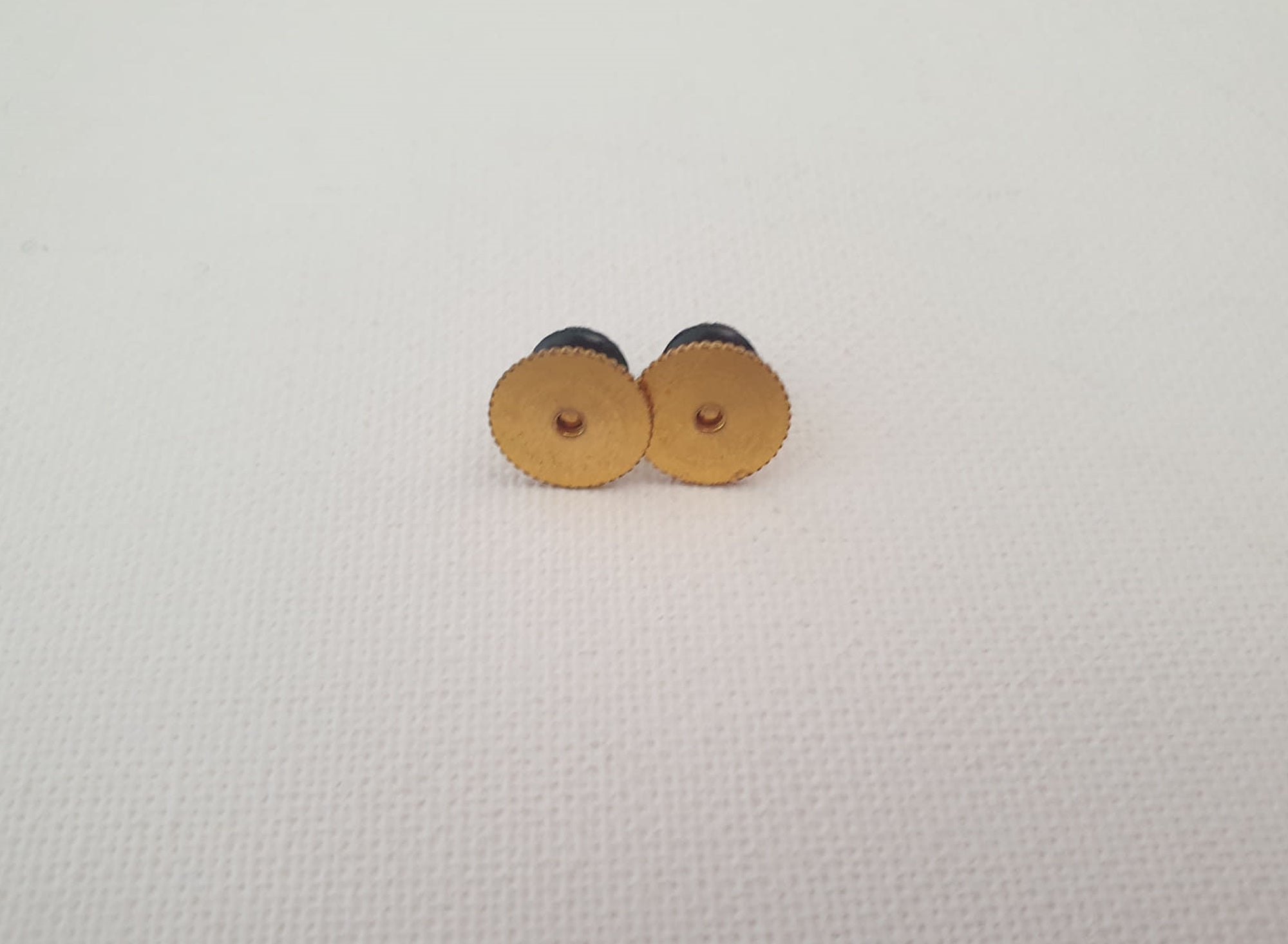 vintage pair of black dimpled shirt studs button style