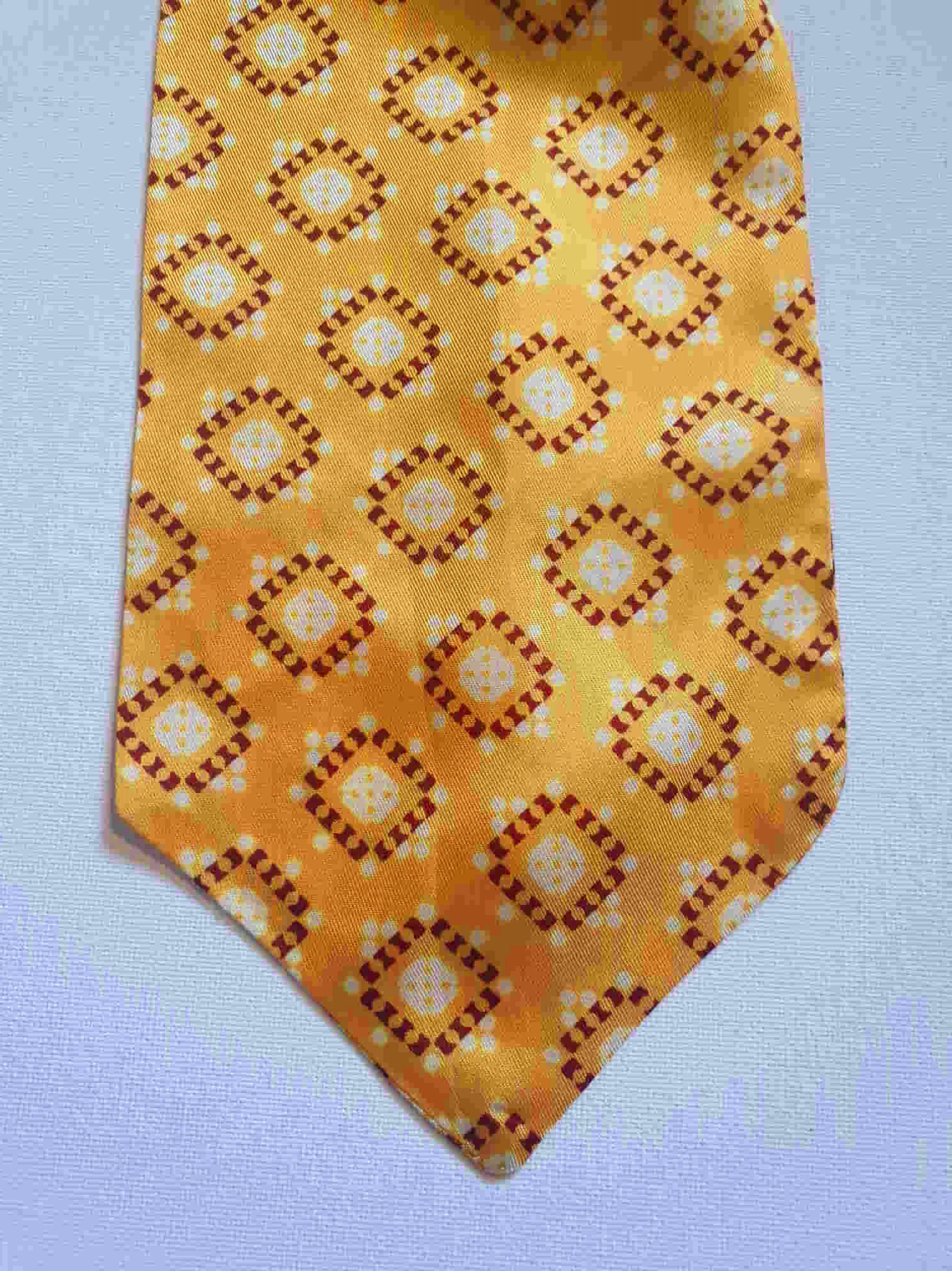 Vintage deep yellow cravat or ascot with brown and white medallions, Rayon, by Vogue of Sydney