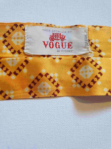 Vintage deep yellow cravat or ascot with brown and white medallions, Rayon, by Vogue of Sydney