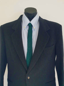 Emerald green skinny tie has a knotty textured bouclé weave. Fabric is rayon. Brand is Town Talk, styled by David Klippel - 1960s.