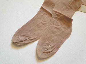 New old stock vintage pantyhose. All over sheer support - relief for active legs. "From waist to toe - gentle support follows your every contour." Cotton gusset and reinforced toe. Colour is Almond - a light beige, skin tone. Brand is Julia's by Kayser - 1980s or early 1990s. Size - Mids