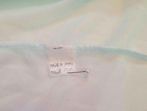 Pretty above knee length blue nightgown has ruffled straps and armholes, lace bodice and front bow. Ruffle at the hemline. Fabric is nylon. No brand label. Made in China. 1980s-1990s.
