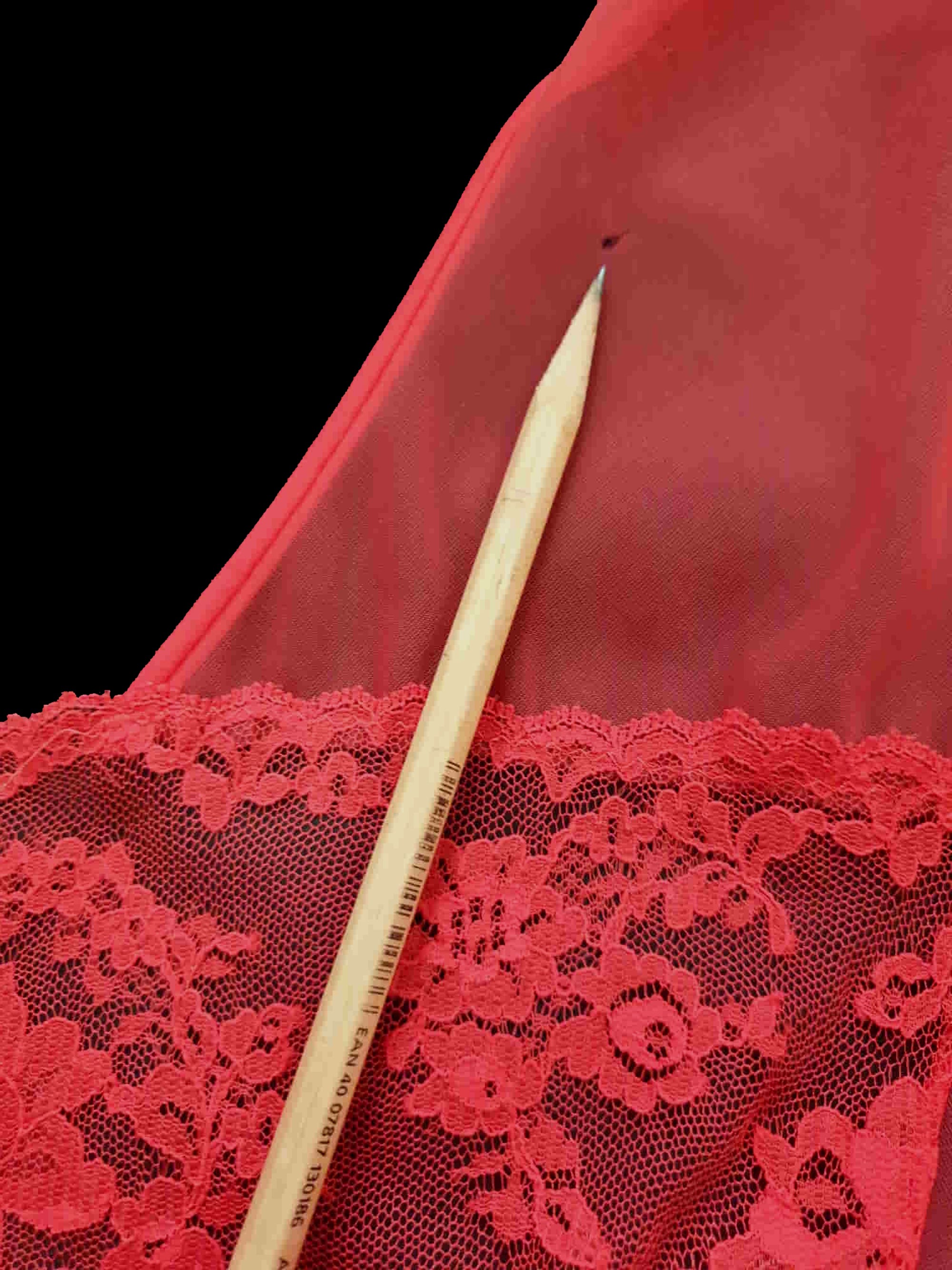 Glamourous  robe or peignoir is very sheer and has full three-quarter length sleeves trimmed with wide lace. The same lace is inserted across the front as a yoke. Closes with a double tie at the neck. Fabric is nylon. Made in the USA for Sears - 1960s. Medium