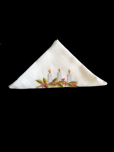 Beautiful hand embroidered Christmas handkerchief, probably made as a Christmas present at least 70 years ago. Three candles and holly leaves beautifully worked on this very fine cotton batiste hanky. If you look at the reverse side in the last photo, it's almost as neat as the front, a sign of superior needlework. The edges have been hem stitched and spoke stitched. 1950s or older.