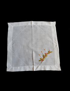 Beautiful hand embroidered Christmas handkerchief, probably made as a Christmas present at least 70 years ago. Three candles and holly leaves beautifully worked on this very fine cotton batiste hanky. If you look at the reverse side in the last photo, it's almost as neat as the front, a sign of superior needlework. The edges have been hem stitched and spoke stitched. 1950s or older.