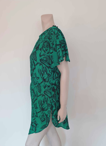 1980s vintage green floral dress or long top to wear over leggings. Slashed butterfly sleeves and slashed skirt. Brand is Katies. Medium