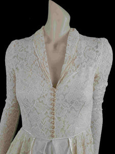 1950s vintage lace wedding gown with long train