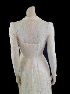 1950s vintage lace wedding gown with long train