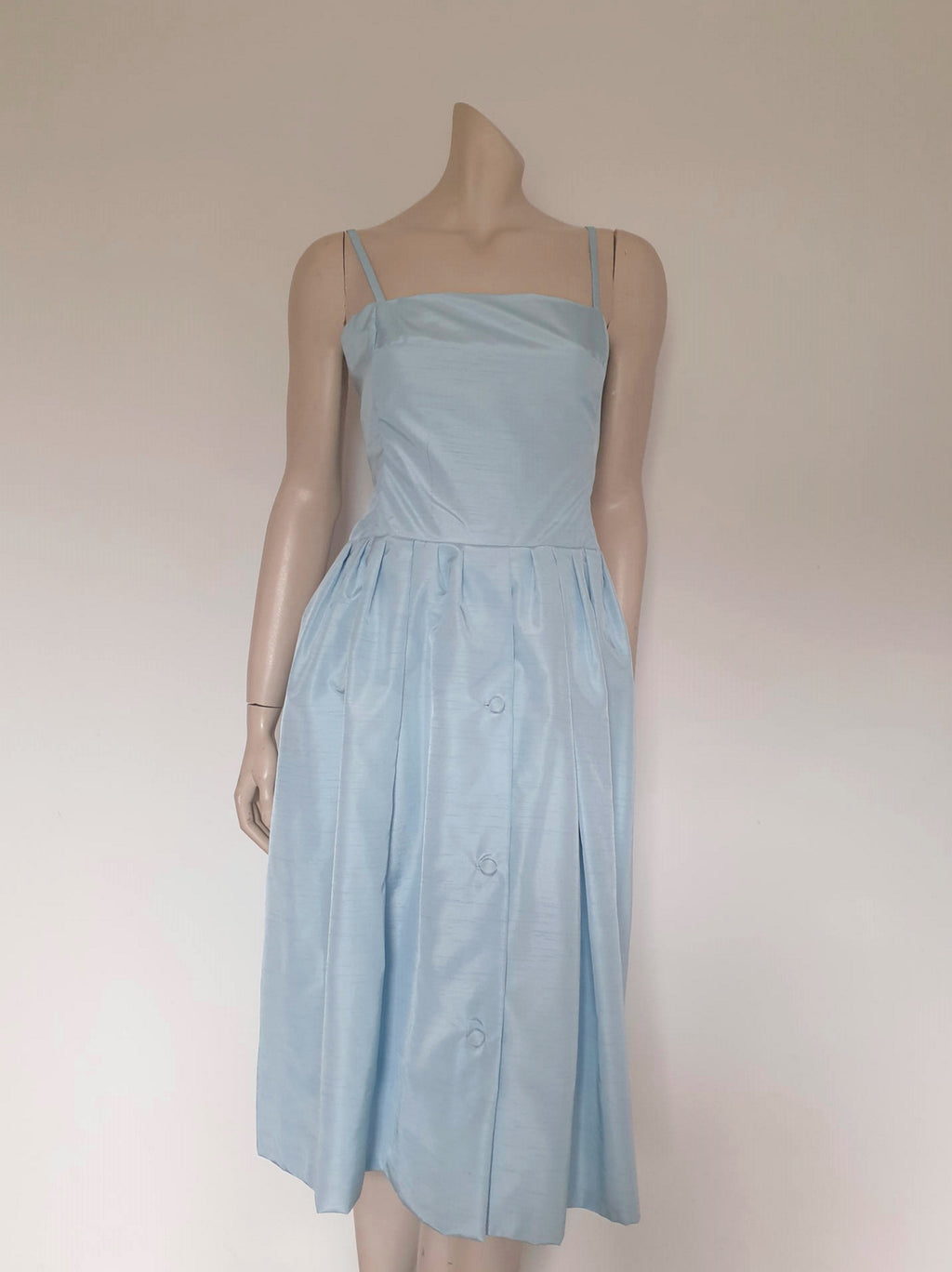1970s vintage light blue faux silk dress with buttoning skirt
