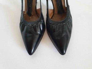 1960s vintage black leather shoes with cut out sides pointy toes stiletto heels
