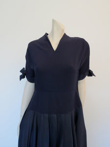 1950s vintage navy blue crepe and taffeta dress with sleeve ties