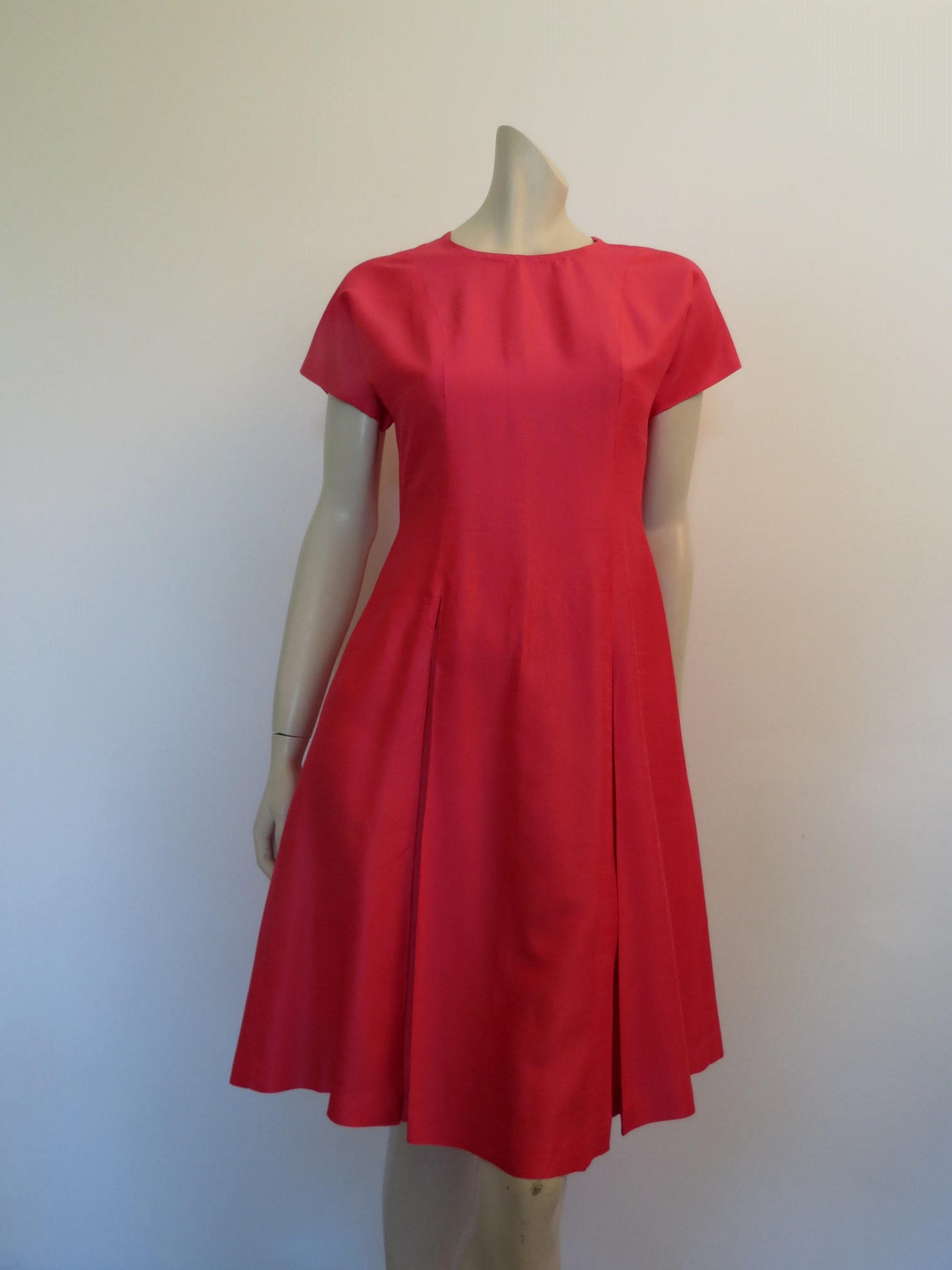 1960s vintage cyclamen pink dress with flared skirt inverted pleats