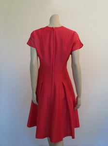 1960s vintage cyclamen pink dress with flared skirt inverted pleats