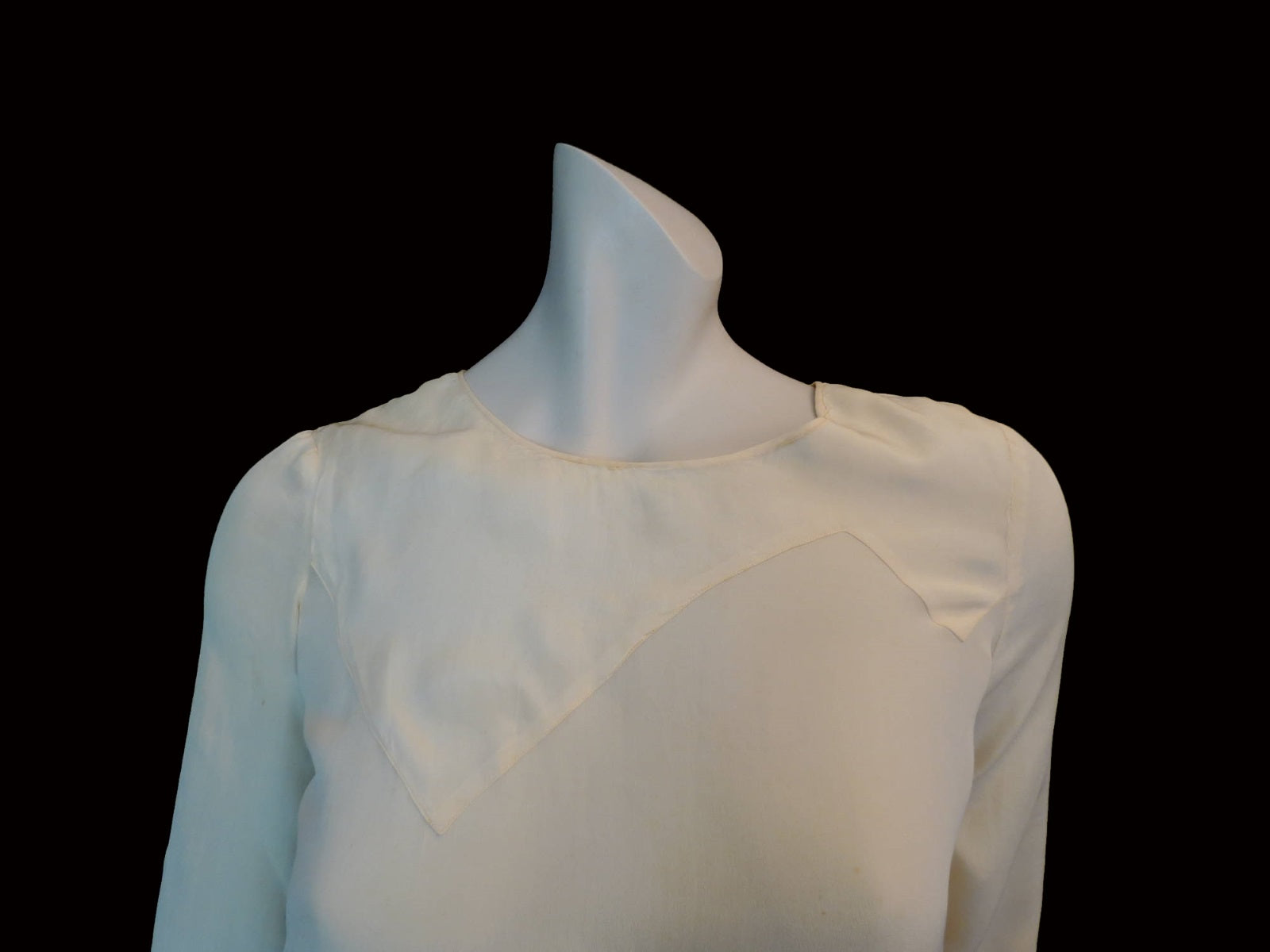vintage 1920s cream silk dress with asymmetric hem and long sleeves